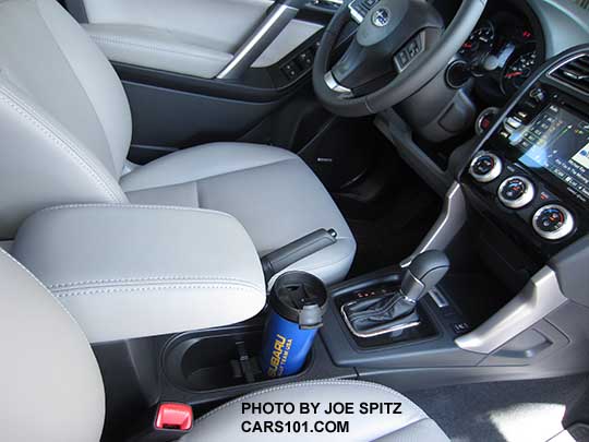 2016 Subaru Forester sliding center armrest on all except base 2.5i model. Shown slid forward.