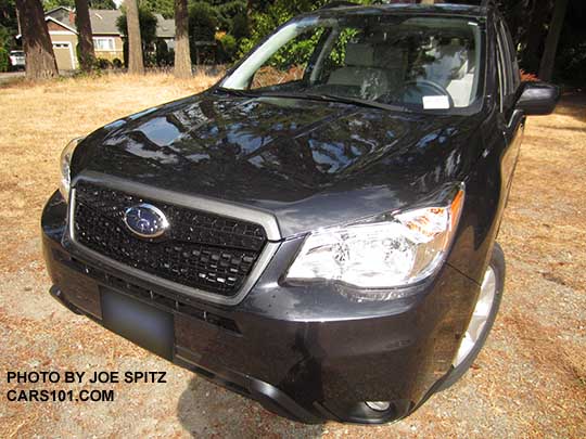 2016 Subaru Forester optional front Sport Grill, on a dark gray Forester