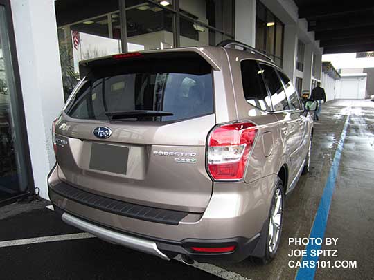 2016 Subaru Forester optional rear bumper underguard and rear bumper cover, shown on a burnished bronze Touring model