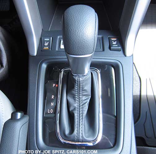 2016 Forester Touring CVT shift knob and gloss black surround. Notice the All Weather Package heated seat buttons