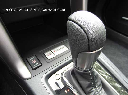 2016 Forester Touring CVT shift knob and gloss black surround. Notice the All Weather Package heated seat buttons