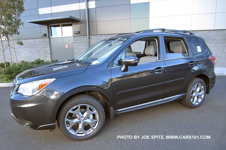 2016 Forester 2.5 Touring with optional side moldings, splash guards. Tourings get 18" alloys, chrome rocker panel strip, turn signal mirrors