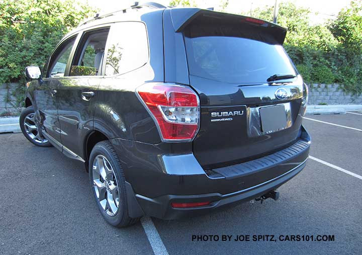 2016 Forester 2.5 Touring with optional rear bumper cover, trailer hitch, side moldings, splash guards. Tourings get 18" alloys, chrome rocker panel trim