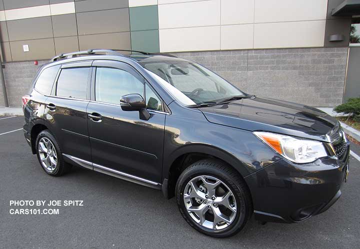 2016 Forester 2.5 Touring, dark gray color, optional side moldings, splash guards. Notice the Tourings alloy wheels and chrome rocker panel strip
