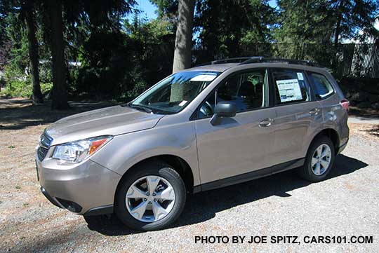 2016 Subaru Forester 2.5i base model with Optional Alloy Wheel Roof Rail package.  Black unpainted outside mirrors. Burnished bronze color shown.