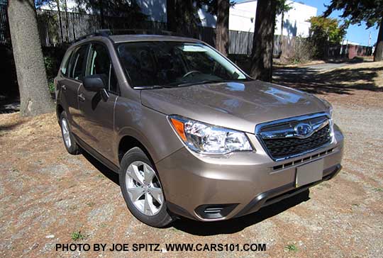 2016 Subaru Forester 2.5i base model with Optional Alloy Wheel Roof Rail package.  Notice the black unpainted outside mirrors. . Burnished bronze color shown.