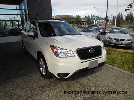 white 2016 Forester Limited with optional front Sport Grill