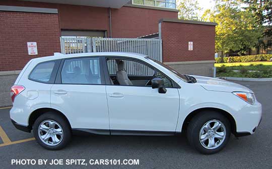 2016 Forester 2.5i base model- no roof rails, no alloy wheels. White shown