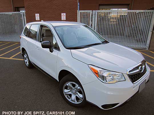 2016 Forester 2.5i base model- no roof rails, no alloy wheels. White shown