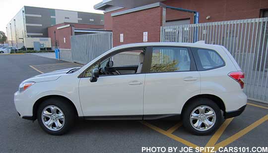 2016 Forester 2.5i base model- no roof rails, no alloy wheels. White shown