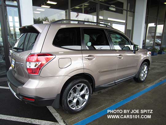 2016 Subaru Forester Touring with optional body side moldings, rear bumper underguard, rear bumper protector, splash guards. Burnished bronze shown.