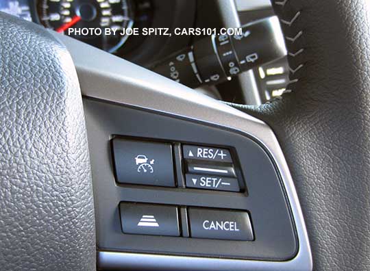 closeup of the 2016 Subaru Forester steering wheel right side cruise control buttons with optional Eyesight- leather wrapped Limited and Touring models