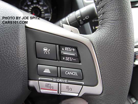 closeup of the 2016 Subaru Forester steering wheel right side Eyesight cruise control and Si Drive buttons- leather wrapped 2.0XT Touring model shown with Si Drive buttons and optional Eyesight