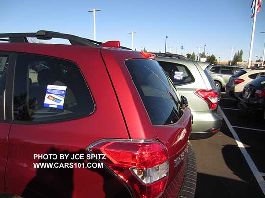 2015 Forester 2.5i and Premium rear tail gate- no rear spoiler, manual open only. Venetian red shown.