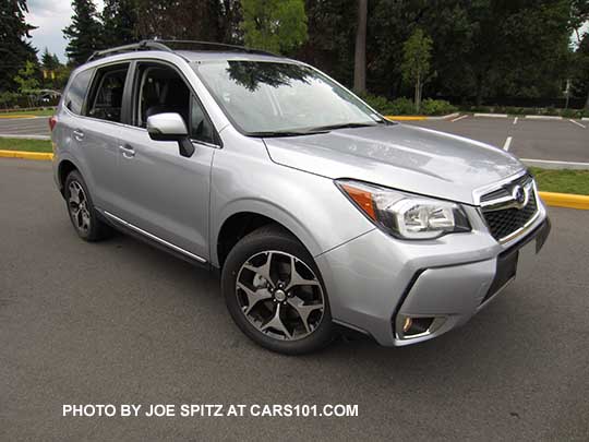 2016 Subaru Forester 2.0XT Touring side view, ice silver shown