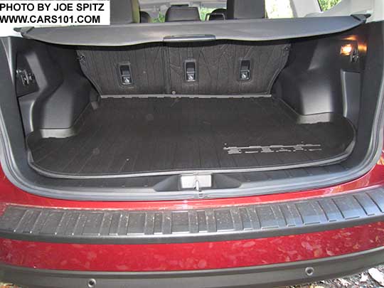 2018 and 2017 Subaru Forester cargo area with rear bumper cover, cargo tray, rear seatback protector, cargo cover.