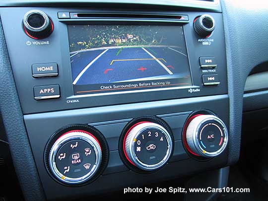 2018 and 2017 Subaru Forester 2.5i base model 6.2" audio screen showing rear view backup camera.  Manual AC/heater controls with 4 speed fan