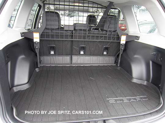 2018 and 2017 Subaru Forester optional dog guard
                  compartment separator, cargo tray, rear seatback
                  protector. No cargo cover with the dog guard