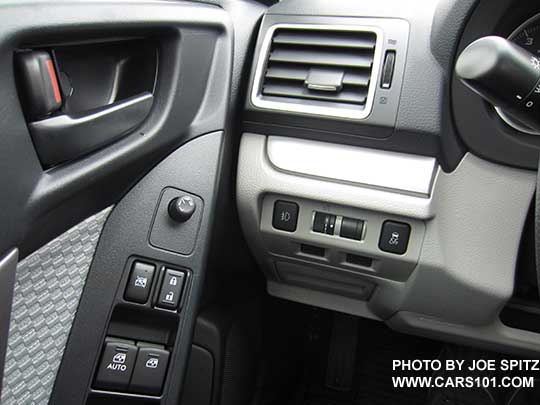 2017 Forester 2.5i base model driver controls with optional fog light switch. All are illuminated (not shown).