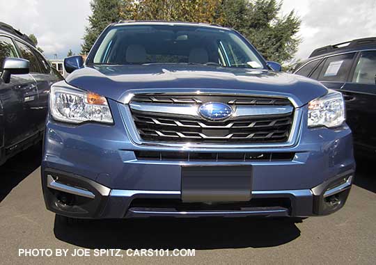 2018 and 2017 Subaru Forester 2.5i, Premium and Limited front grill with chrome strip. Quartz blue car shown.