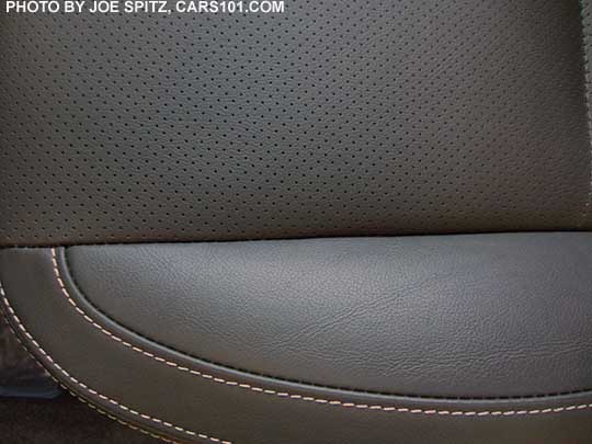 closeup
                  of the 2018 and 2017 Subaru Forester perforated black
                  leather interior, silver stitching