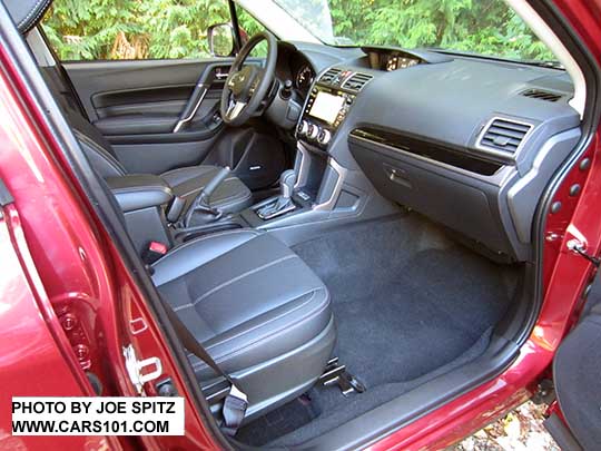 2018 and 2017 Forester Limited and Touring model black leather trimmed interior. Venetian red car shown.. Touring model shown.