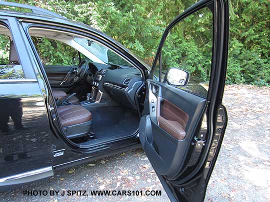 2018 and 2017 Subaru Forester Touring saddle brown interior in a dark gray car