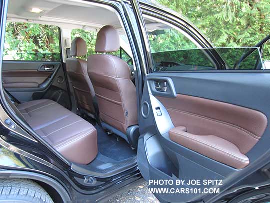 2018 and 2017 Subaru Forester Touring 2.5i and 2.0XT rear door and rear seat. Saddle brown leather shown. Limited and Touring models have both driver and passenger front seatback map pockets