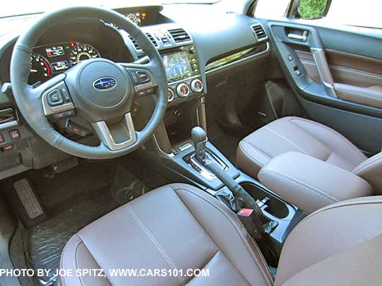 2018 and 2017 Subaru Forester 2.5i and 2.0XT Touring saddle brown leather front seats, with center armrest in the forward position