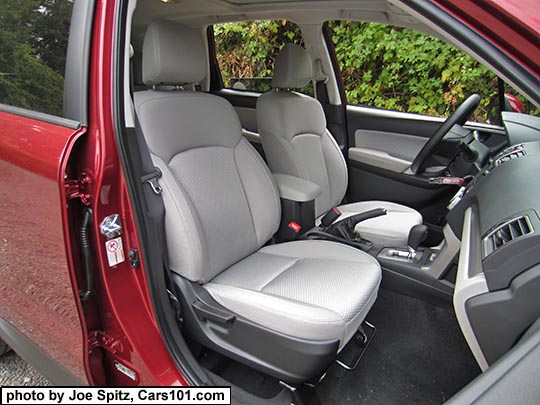 2018 and 2017 Subaru Forester Premium platinum gray cloth front driver and passenger seat.  Venetian red car shown.