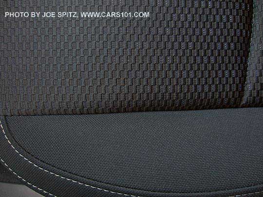 closeup of the 2018 and 2017 Subaru Forester 2.5i and 2.5i Premium black cloth interior, silver stitching