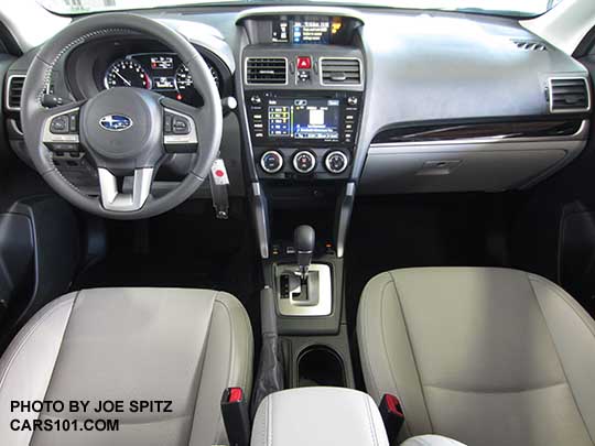 2018 and 2017 Subaru Forester Limited interior, platinum gray leather interior, has gloss back dash trim with silver shift surround