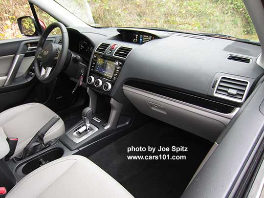 2017 Subaru Forester 2.5 Limited, platinum leather shown. Silver shift plate, gloss black dash trim