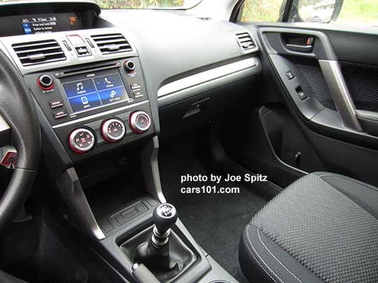 2018 and 2017 Subaru Forester 2.5 base model manual transmission, black cloth, silver dash trim, 6.2" audio with matte gray surround