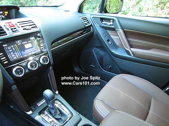 2017 Subaru Forester Touring saddle brown leather trimmed interior with piano gloss black dash and shift trim, and leather console trim