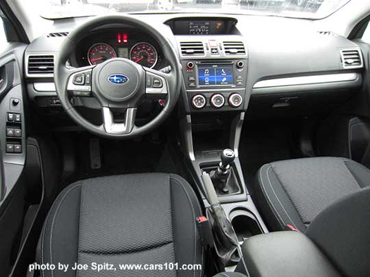 2017 Subaru Forester 2.5 base model manual transmission, black cloth, silver dash trim, 6.2" audio with matte gray surround