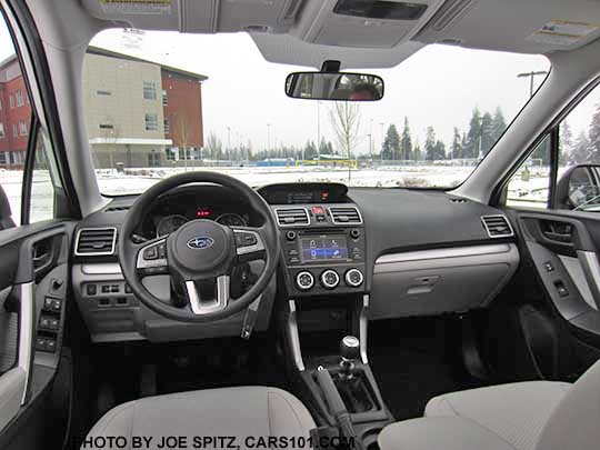 2018 and 2017 Subaru Forester 2.5i manual transmission front dash with silver trim, 6.2" audio screen, platinum gray cloth