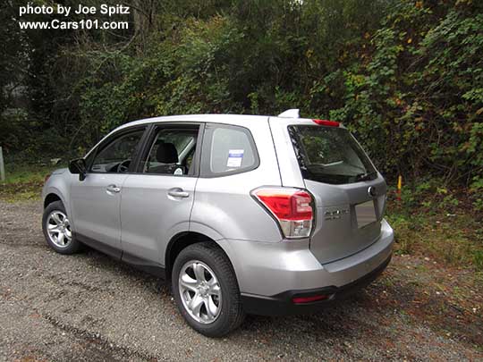 2017 Subaru Forester 2.5i base model, has steel wheels, no dark tinted windows, no roof rails. Silver color