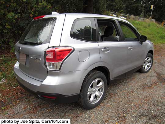 2017 Subaru Forester 2.5i base model, has steel wheels, no dark tinted windows, no roof rails. Ice silver shown