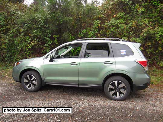 2018 and 2017 Subaru Forester. Jasmine Green color, a pale green. Limited model shown.