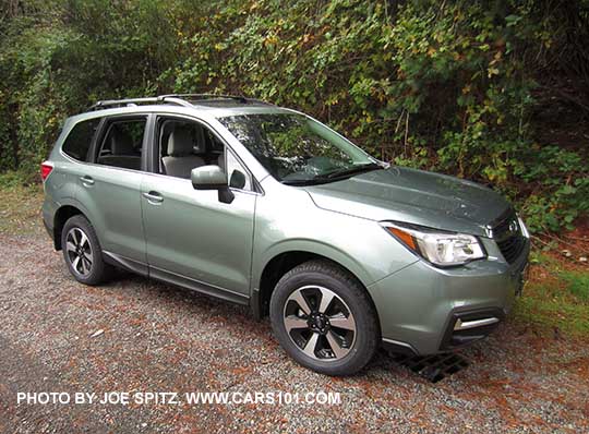 2018 and 2017 Subaru Forester. Jasmine Green color, a pale green. Limited model shown.
