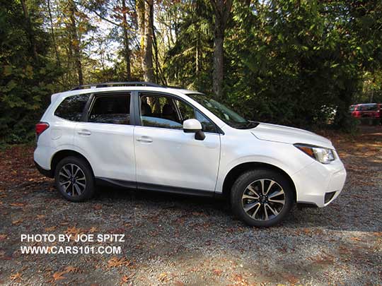 side view 2018 and  2017 Subaru Forester 2.0XT Premium, crystal white color