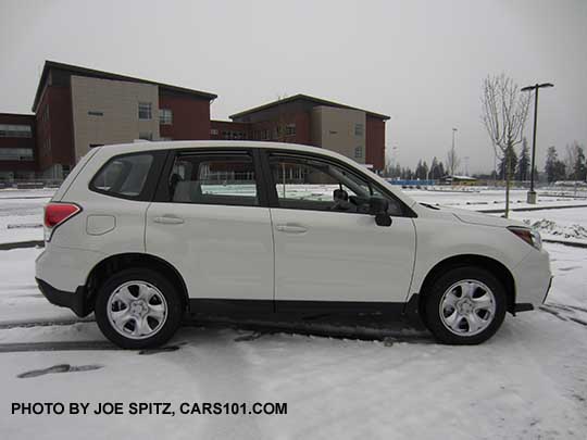 profile 2017 Subaru Forester 2.5i base model. Color white shown