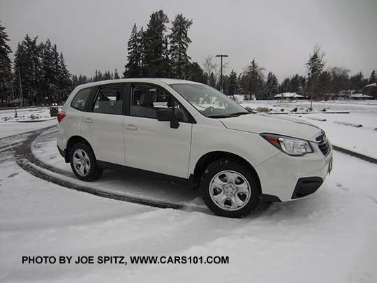 2017 Subaru Forester 2.5i, black mirrors, steel wheels, no roof rails or dark tinted rear glass.  Color white shown