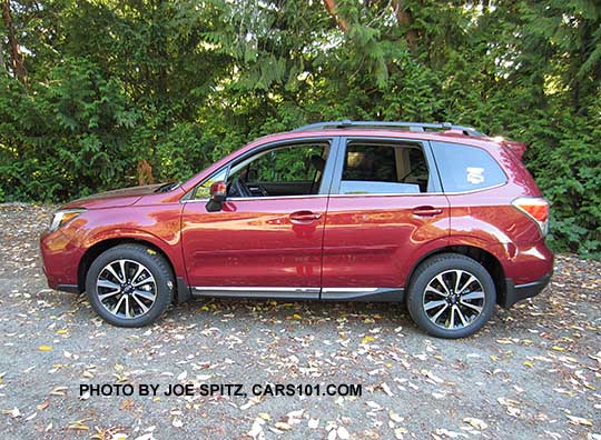 2018 and 2017 Subaru Forester 2.0XT Touring with rear spoiler, chrome rocker panel trim, dark rear glass,  redesigned XT model 18" split-spoke black and silver alloys,  Venetian Red shown.