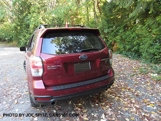 2018 and 2017 Forester rear view with optional rear bumper protector. XT model (see logo on right rear)