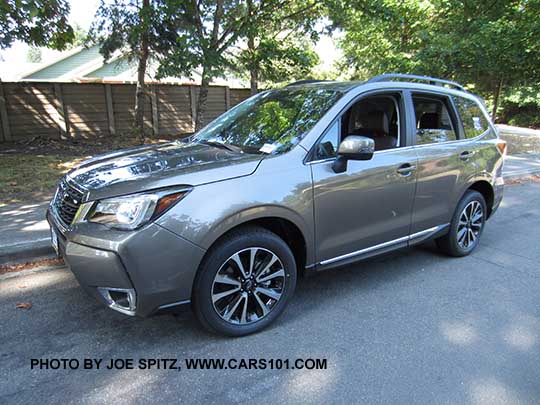 2018 and 2017 Forester 2.0XT Touring. Sepia Bronze Metallic color shown. 18" black and silver alloy wheels, chrome rocker panel trim