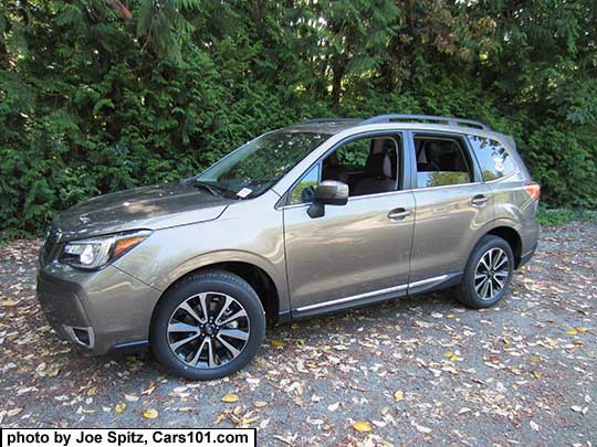 2017 Forester 2.0XT Touring with chrome rocker panel trim. Sepia Bronze Metallic color shown. XT model shown with  18" black and silver 5 split-spoke alloy wheels