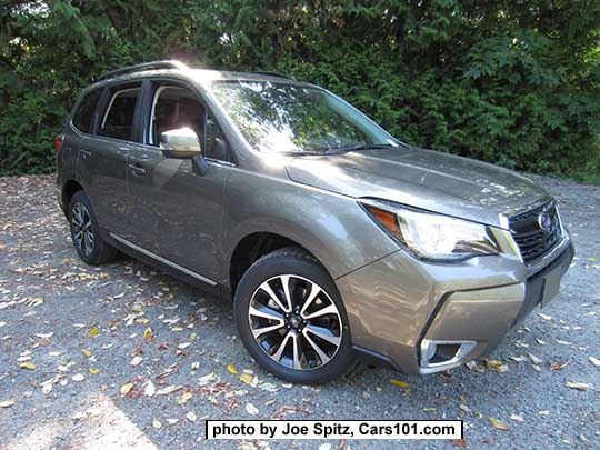 2018 and 2017 Forester 2.0XT Touring with chrome fog light trim and rocker panel strip. Sepia Bronze Metallic color shown. XT model has blacked-out front grill and redesigned for 2017 18" black and silver 5 split-spoke alloy wheels