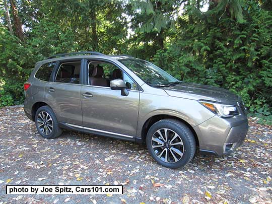 2018 and 2017 Forester 2.0XT Touring with chrome rocker panel strip and fog light trim. Sepia Bronze Metallic color shown. XT model has redesigned for 2017 18" black and silver 5 split-spoke alloy wheels